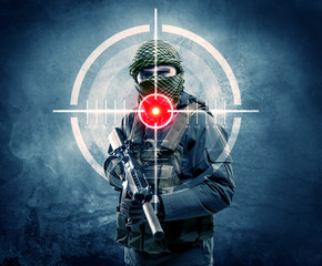 Masked terrorist man with gun and laser target on his body concept 