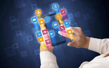 Female hand using smartphone with colorful angular fast switching application icons around
