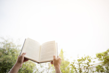 Handle books to educate. On the back of the sky.