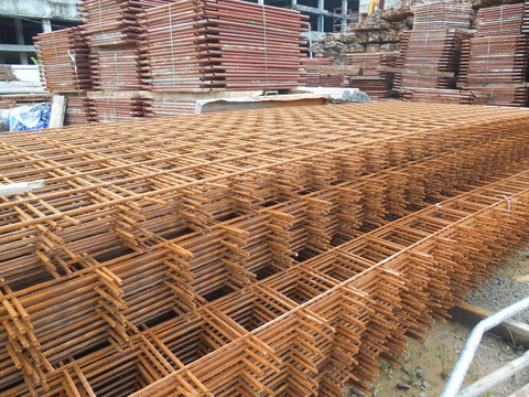 Welded Wiremesh, or BRC Fabric used as part of main structure component in floor slab material element in the construction site. 