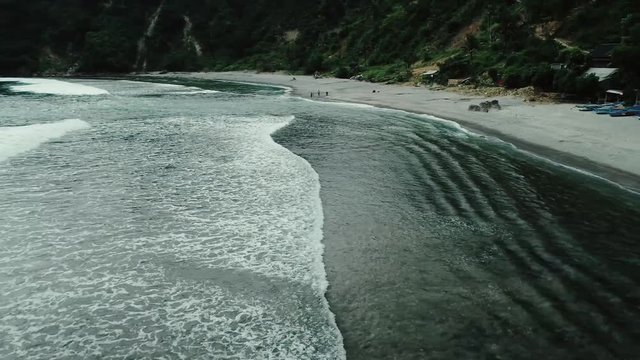 Aerial footage of seascape Nampu beach, South Yogyakarta, Indonesia - March, 2018