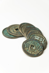 Ancient Chinese bronze coins on white background