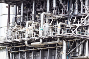 Equipment, cables and piping as found inside of industrial power plant
