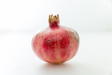 Pomegranate with cracks on the skin