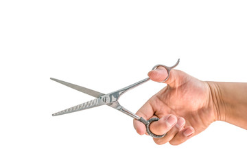 Woman hand holding scissors isolated on white background with clipping path