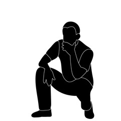 silhouette man sitting down
