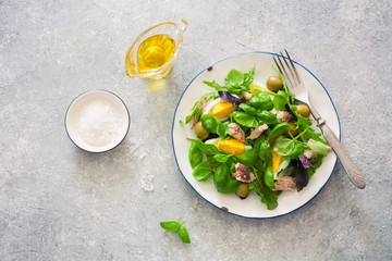 Mediterranean-style salad with lettuce, tuna, chicken eggs