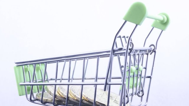 Metal basket with Bitcoins