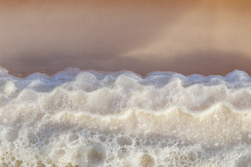 Texture of raw salt on sea water in evaporation ponds process at Phetchaburi province,Thailand ( Fleur De Sel )