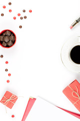 Cup of coffee, chocolate sweets, gift box flat lay. Feminine background.