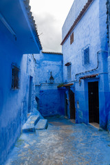 Street and house in blue