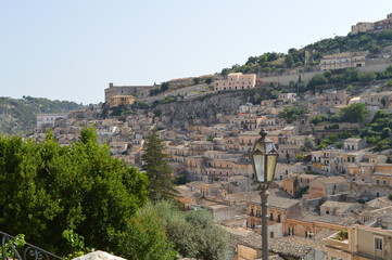 Fototapeta na wymiar View of an Ancient Foreshortening of Modica, the City of Chocolate, Ragusa, Sicily, Italy