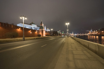 Night Moscow image. Cloudy. Night lights of city do colorful the night in Moscow. Kremlin wall and Government House are very bright.