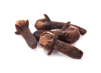 dry cloves on white background