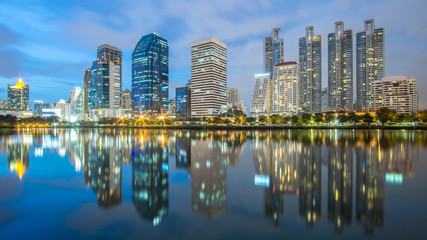 Fototapeta na wymiar Bangkok city - Cityscape downtown Business district urban area at night ,reflection landscape Bangkok Thailand