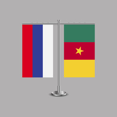 Table stand with flags of Russia and Cameroon.Two flag. Flag pole. Symbolizing the cooperation between the two countries.Table flags