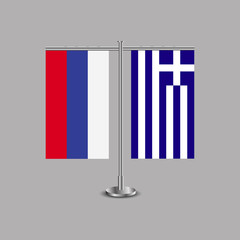 Table stand with flags of Russia and Greece.Two flag. Flag pole. Symbolizing the cooperation between the two countries.Table flags