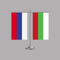 Table stand with flags of Russia and Bulgaria.Two flag. Flag pole. Symbolizing the cooperation between the two countries.Table flags