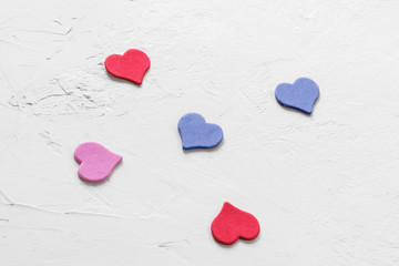 group of multi-colored hearts on white hand drawn background. Close-up, copy space