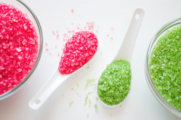 red and green bath salt on white background
