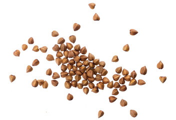 Close up of buckwheat grains isolated on white background. Top view