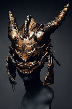 Mannequin in bronze helmet 