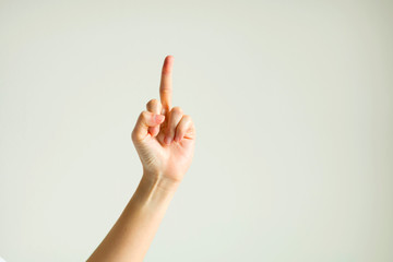 Hand sign showing middle finger.