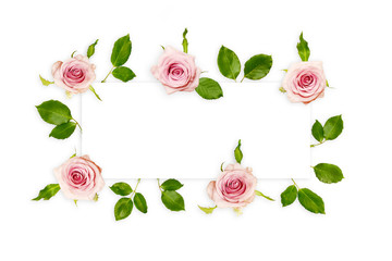 Frame with fresh pink roses and green leaves isolated on white, top view. Beautiful flowers background with empty space for text.