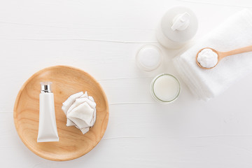 Fototapeta premium Homemade coconut products on white wooden table background from top view. Good for space and background.