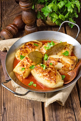 baked cabbage rolls in tomato sauce