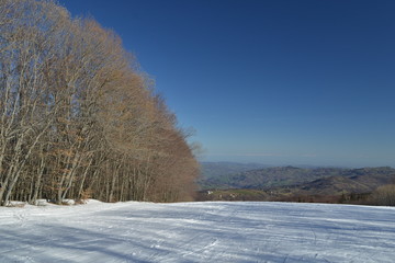 winter sports, skiing and snowboarding in italian mountain