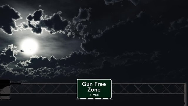4K Passing Gun Free Zone Sign at Night