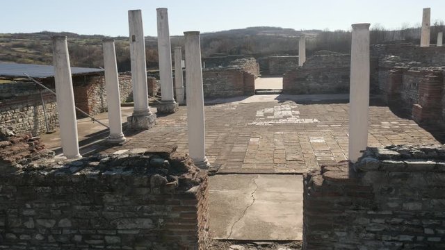 Slow tilt on temple hall columns of Felix Romuliana built by Roman Emperor Galerius. The construction started in 298 AD