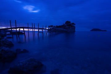 View from Agios Sostis and Cameo island with wooden bridge shot before sunrise . Zakynthos Greece.