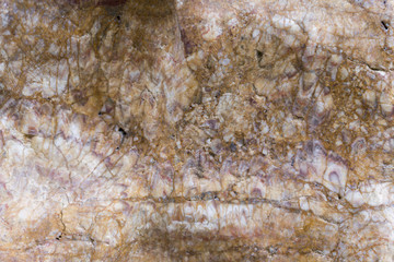 Brown stone with cracks. background. Marble background