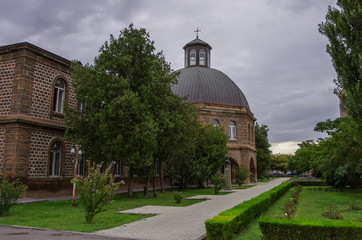 Fototapeta na wymiar Gevorkian Theological Seminary of St. Echmiadzin.It is one of popular tourist destination and center of country religious life