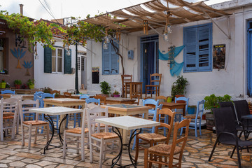 Typical greek restaurant on a sunny summer day at Keri village, Zakynthos island, Greece.