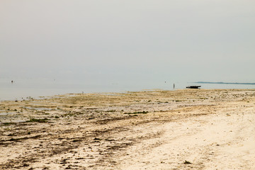 Landscape with sparkling blue water off the white beaches of the Indian Ocean spice island of Zanzibar (Unguja), Tanzania