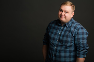 confident caucasian fat man looking at camera