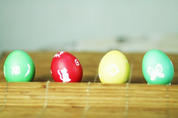 Colorful easter eggs on the table background
