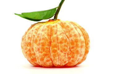 Clementine or Mandarin orange isolated on a white background.
mandarin without a peel but have a left  isolated on white background