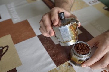 Fototapeta na wymiar Drink a cup of coffee prepared with a mocha coffee maker for a good Italian coffee.