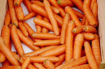 a lot of Bio carrot with wooden box  in the morning market