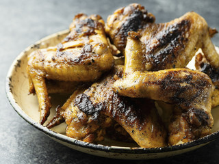 plate of barbecue chicken wing