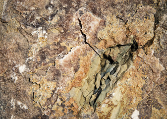 crack on colorful rock