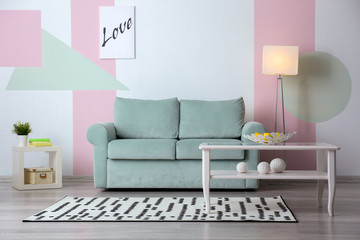 Fototapeta na wymiar Living room interior with comfortable sofa
