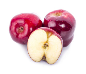 Red apple with leaf and apple slices isolated on a white background.