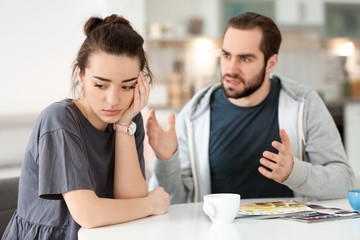 Young couple having argument at home
