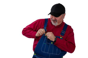 Farmer fiddling with the fastener on his bib