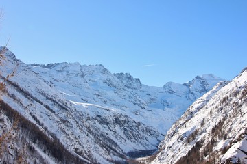 Valley of Valnontey, snowy landscape. Gran Paradiso peak, Aosta Valley, Gran Paradiso National Park, Italy